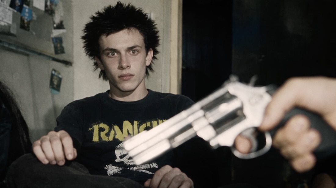 A revolver pointed at Gabriel