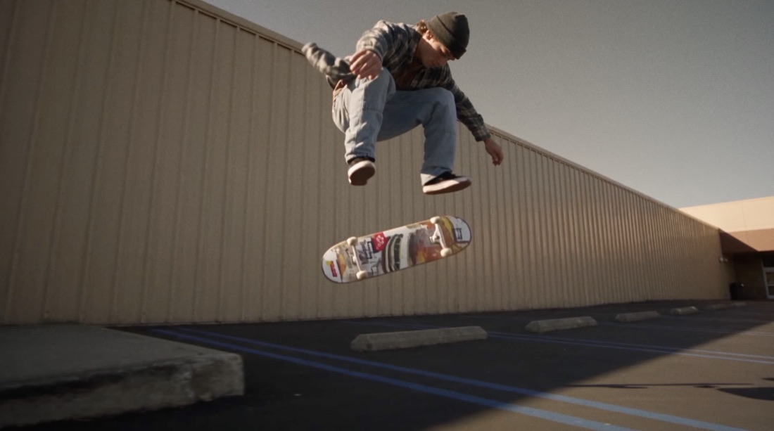 A skater mid-kickflip
