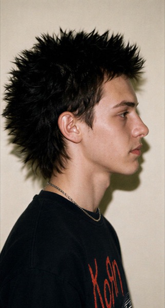 Punk Gabriel with spiked hair, profile