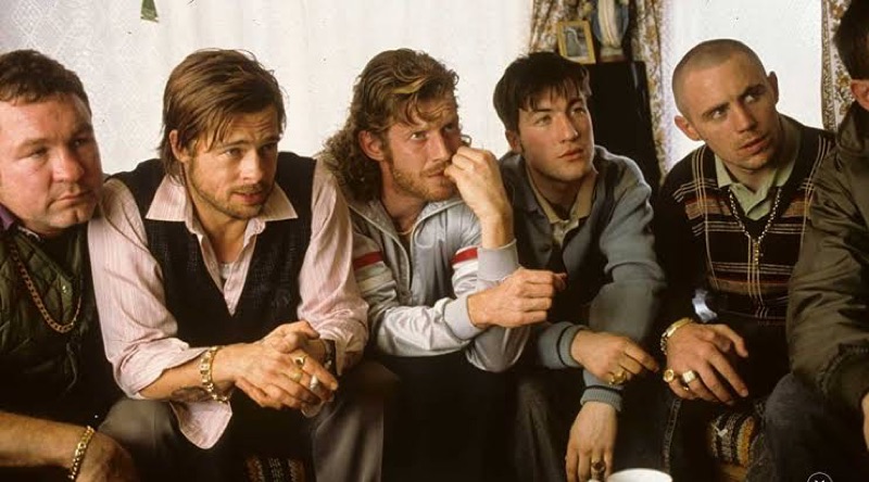 Snatch (2000): men huddled on a sofa